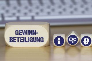 © magele-picture - stock.adobe.com figure_photo: Schriftzug Gewinnbeteiligung
